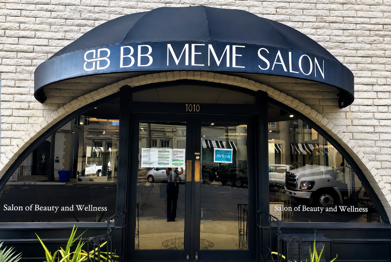 BB Meme Salon storefront at 1010 with glass doors and dark awning against brick wall